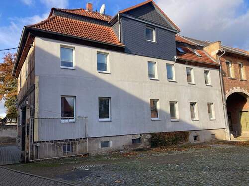 Rückansicht Wohnhaus - 1 Zimmer Mehrfamilienhaus, Wohnhaus in Osterwieck