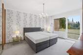 Schlafzimmer mit Balkon - 