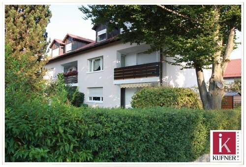 Außenansicht des Wohnhauses - **Tolle 3 Zi.-Whg mit neuer EBK, Sonnenbalkon und Garage in ruhiger Wohnlage in Neufahrn (S1)**