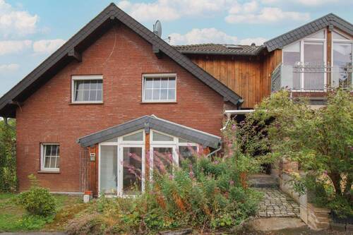 Anbau mit Einliegerwohnung - 