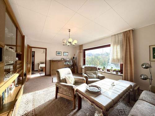 Wohnzimmer - 5 Zimmer Einfamilienhaus zum Kaufen in Sulzbach