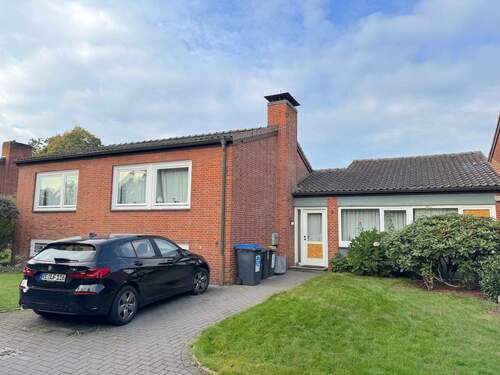 Vorderansicht mit Stellplatz - Reihenbungalow in bevorzugter Wohnlage von Marl (Drewer Süd)