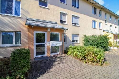 Objektansicht hinten - Vermietete 3 Zimmer mit Balkon in beliebter Lage