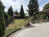 Blick in den Garten - Einfamilienhaus mit 215,00 m&sup2; in Hannover / Kirchrode zum Kaufen