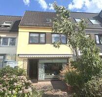 PURNHAGEN-IMMOBILIEN - Stuhr-Moordeich, gepflegtes Reihenmittelhaus mit Garage in ruhiger Lage - Stuhr / Moordeich