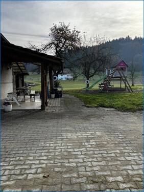 Garten mit überdachtem Sitzplatz - 