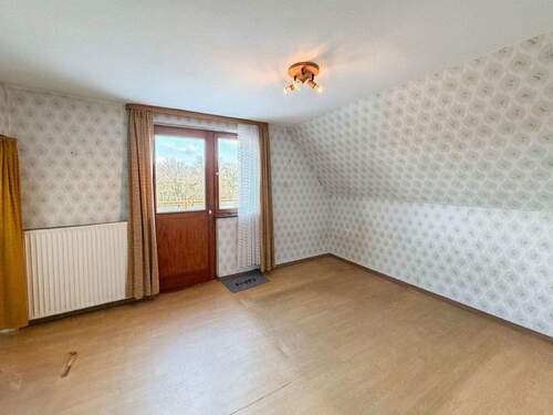 Schlafzimmer mit Zugang zur Dachterrasse - 