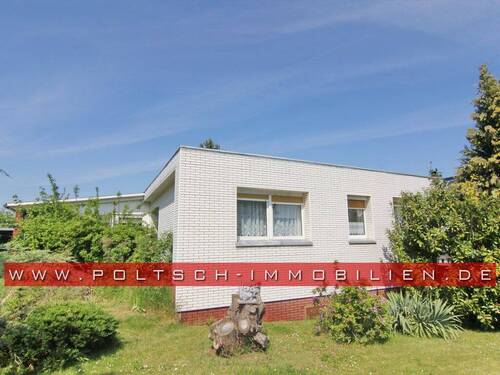 Hausansicht - EFH im Bungalowstil mit Wintergarten, Keller und großem Grundstück in ruhiger Siedlungslage