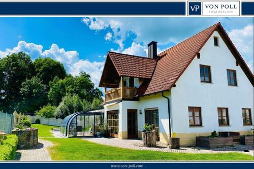 Bild 1 - Premium-Wohntraum in Waldrandlage - Einfamilienhaus mit Pool und Weitblick