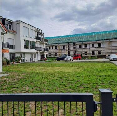 Nachbarbebauung und Neubau C - 2 Zimmer Etagenwohnung zur Miete in Nauen