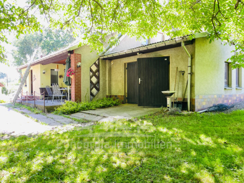 Ostansicht mit Garage - 7 Zimmer Mehrfamilienhaus, Wohnhaus zum Kaufen in Reinsberg