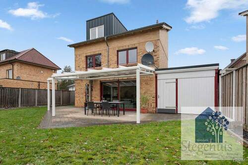 Hinteransicht - ***STEGEHUIS GMBH*** Modernes und familienfreundliches Einfamilienhaus in Gronau nahe der Niederländische grenze.