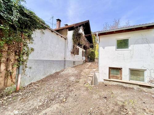 Gartenansicht Garage und Vordergebäude - 