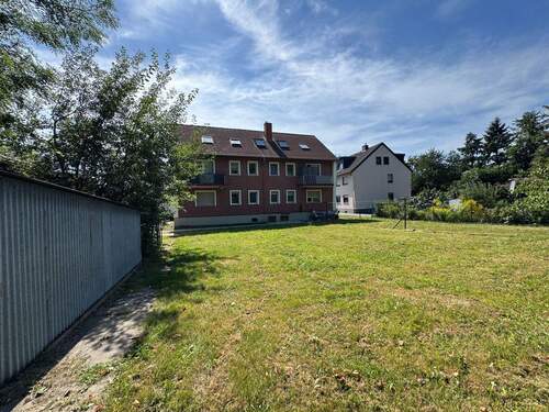 Rückansicht - 2 Zimmer Mehrfamilienhaus, Wohnhaus zum Kaufen in Bergheim