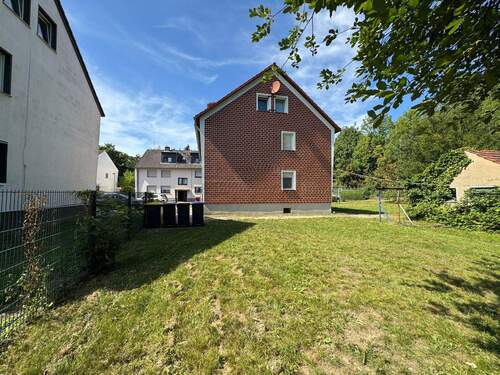 Seitenansicht - 2 Zimmer Mehrfamilienhaus, Wohnhaus in Bergheim