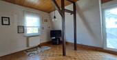 Wohnzimmer 1.1 OG mit Zugang zur Terasse - 