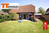 Außenansicht - TT bietet an: Hübsche Doppelhaushälfte mit Gartenidylle - ruhig gelegen in Sande!