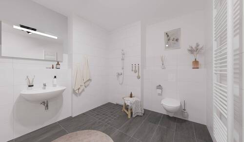 Ein modern gefliestes Badezimmer mit bodengleicher Dusche - 2 Zimmer Etagenwohnung in Rostock