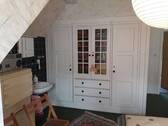 Schlafzimmer mit Einbauschrank im DG - 