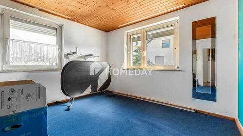 1. OG Schlafzimmer 1 - 