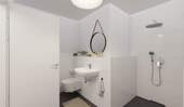 Modern gefliestes Badezimmer mit bodengleicher Dusche - 