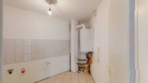 Hauswirtschaftsraum mit Gasetagenheizung - 