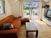 Wohnzimmer - Willkommen in Ihrer großzügigen Wohnung mit Neubaucharakter