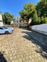 Einfahrt Hinterseite - Mehrfamilienhaus, Wohnhaus mit 422,00 m² in Haan zum Kaufen