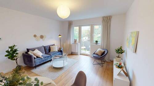 Helles Wohnzimmer mit Sofa - CITY-APARTMENT MIT BALKON VIS-À-VIS MUSEUMSPARK - ERSTBEZUG NACH SANIERUNG!