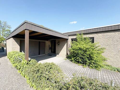 Außenbild neu - Wohnen auf einer Ebene: Attraktiver Bungalow in bevorzugter Lage von Warendorf!