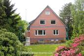 Straßenansicht - Gepflegte 4-Zimmer-Wohnung Nähe Oortkatensee
