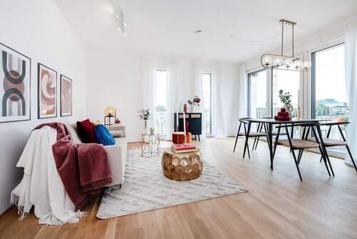Wohnzimmer - Mini-Maxi: 3-Zimmer-Wohnung mit großzügigem Garten und Terrasse in Süd-Ausrichtung