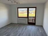 Wohnzimmer - 2 Zimmer Etagenwohnung zum Kaufen in Weiler-Simmerberg