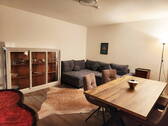 Der Esstisch im Wohnzimmer - 2 Zimmer Etagenwohnung in München