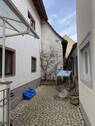 Innenhof - 1 Zimmer Mehrfamilienhaus, Wohnhaus in Sulzburg
