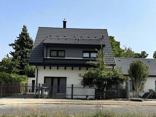 Straßenanicht - Einfamilienhaus mit 113,60 m² in Berlin zum Kaufen