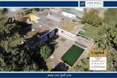 Titelbild neu2 - Blickgeschützter Bungalow mit Einliegerbereich, großzügigem Grundstück & Pool