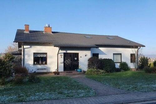 Vorderansicht - 9 Zimmer Einfamilienhaus zum Kaufen in Ottweiler