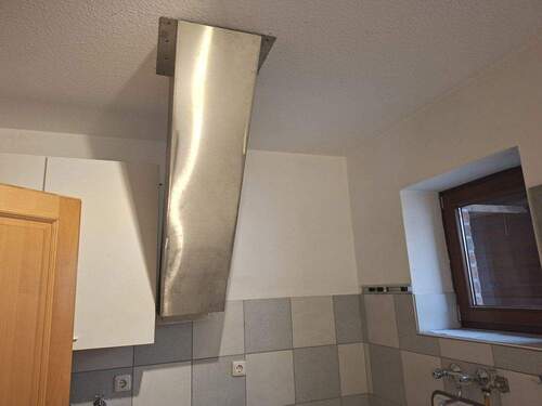 Hauswirtschaftsraum mit Wäscherutsche - 