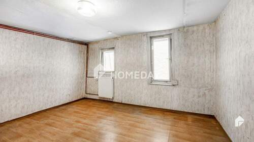 1. OG Schlafzimmer 1 - 