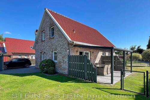 Seitenansicht - 4 Zimmer Mehrfamilienhaus, Wohnhaus in Großheide
