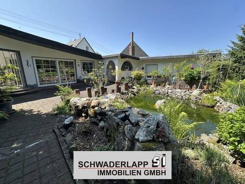 01_Rückansicht - Vielseitiges Wohnhaus mit gepflegtem Grundstück in ruhiger Lage von Wirscheid