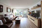 Wohnzimmer Bild 2 - Reihenmittelhaus mit 112,00 m² in Garbsen zum Kaufen