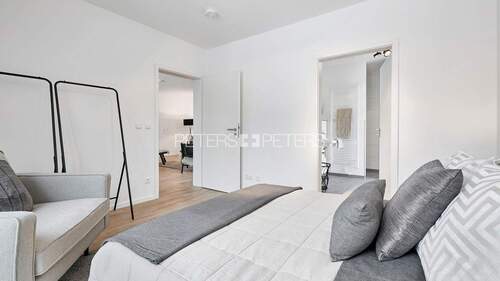 Schlafzimmer / en-suite Bad, Musterwohnung - 3 Zimmer Etagenwohnung in Neu Wulmstorf