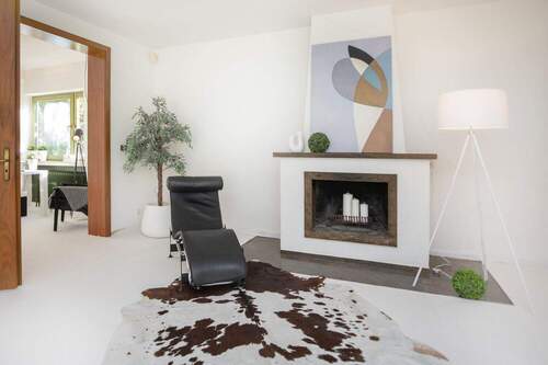 Wohnzimmer/Kamin - Einfamilienhaus mit 211,50 m² in Dreieich zum Kaufen