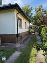 Seitenansicht mit Carport - 