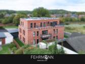 Bild 1 - Zentral wohnen in Lathen: Helle OG-Wohnung mit Balkon & Aufzug - zur Miete!