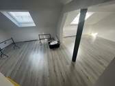 Großraumbüro im Dachgeschoss - 
