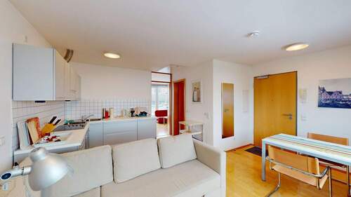 Wohn- und Essbereich mit offener Küche - 