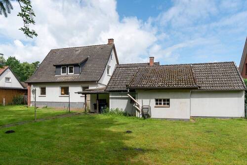 Gartenansicht - 6 Zimmer Einfamilienhaus zum Kaufen in Lauenbrück